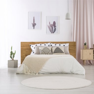 Runder Teppich im Schlafzimmer